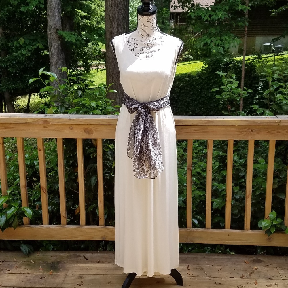 Elegant Cream Maxi Dress with Decorative Black Belt